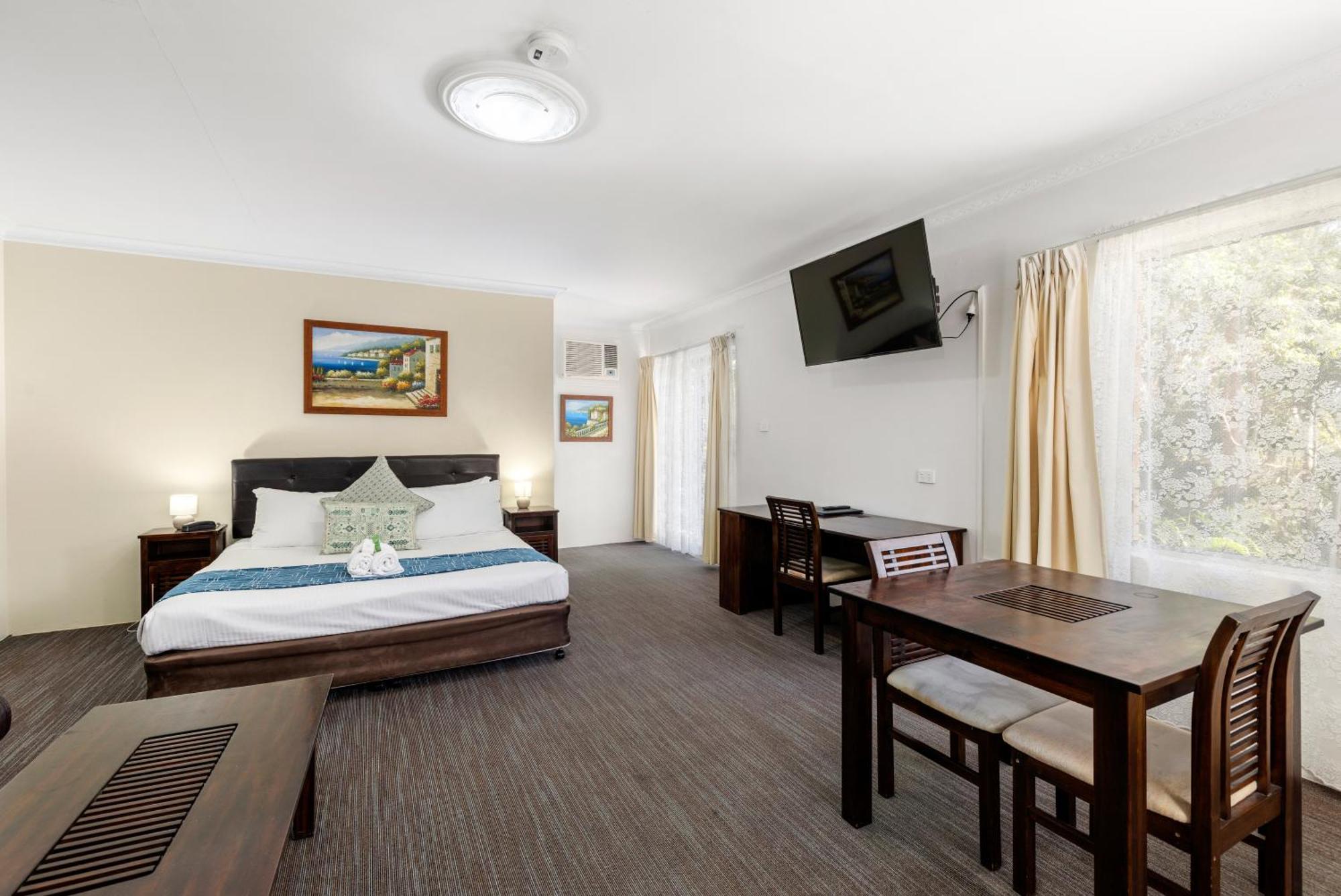 Sanctuary Resort Motor Inn Κοφς Χάρμπουρ Εξωτερικό φωτογραφία